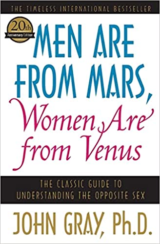 Reading in a book: Men are from Mars, Women are from Venus, by John Gras.